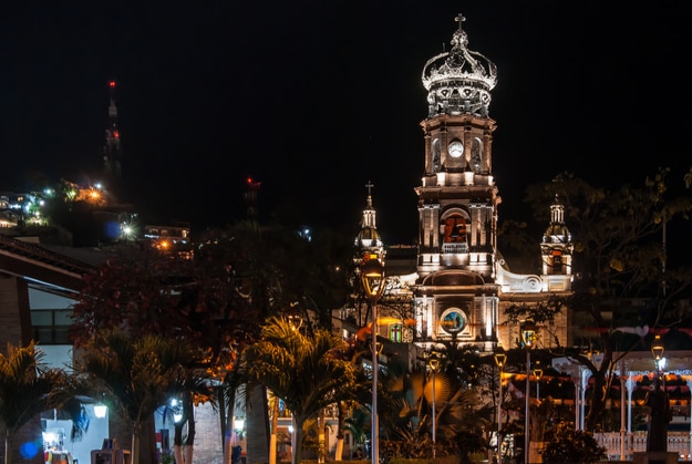 A night shot of the front of the cathedral in Puerto Vallarta