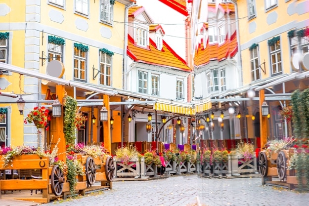 Beautiful buildings with reflection on Livu square in the old town of Riga, Latvia