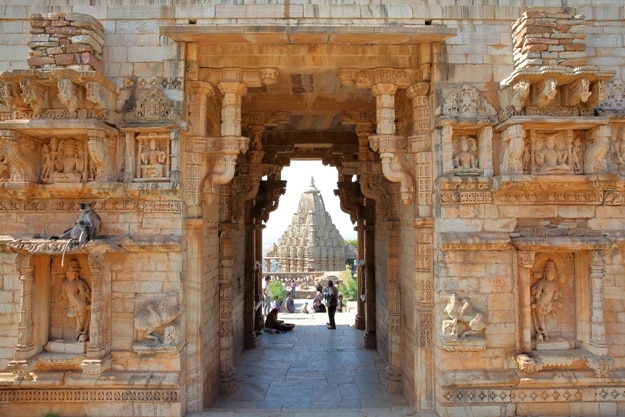 Mahasati Gate located inside the fort (Garh) of Chittorgarh, with Samideshwar Hindu Temple in the background