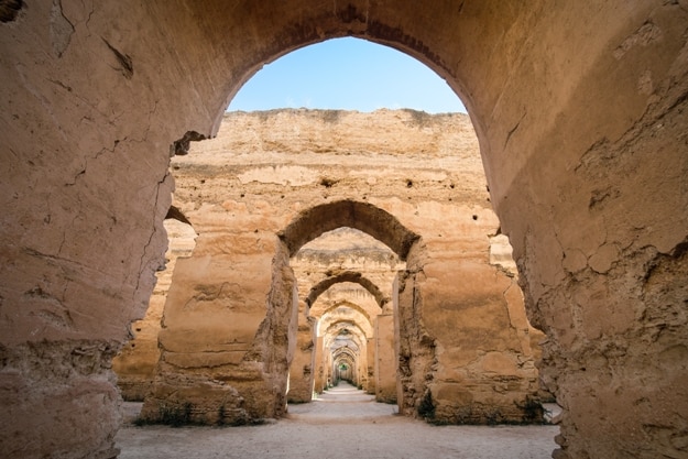 Meknes old city granary walls in Morocco. Artistic interpretation wide lens