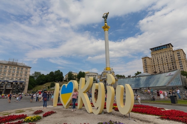 People on the Independence Square at the installation I love Kiev in Ukrainian