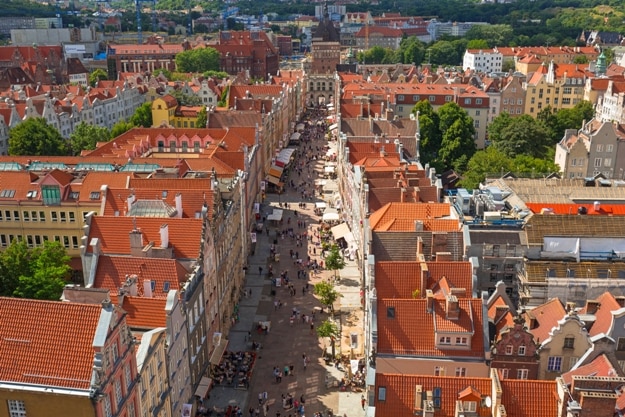 People on the Long Lane of the old town in Gdansk, Poland. Gdansk is the historical capital of Polish Pomerania
