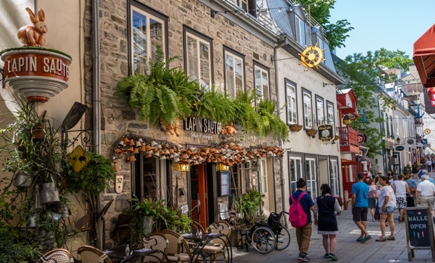 Quebec City, Quebec, Canada - June 2017, pedestrian exploring french charm of old town