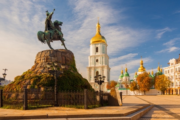 Scenic view on Hetman Bohdan Khmelnitsky monument and Saint Sophia's Cathedral on Sofia Square, Kyiv, Ukraine. Beautiful autumn scenery