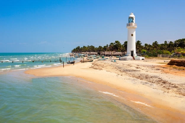 Talaimannar Lighthouse. Talaimannar is located on the northwestern coast of Mannar Island and about 18 miles from Dhanushkodi indian town
