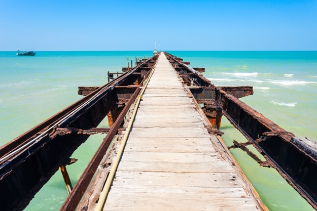 Talaimannar pier, Sri Lanka. Talaimannar is located on the northwestern coast of Mannar Island and about 18 miles from Dhanushkodi indian town