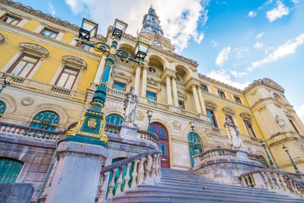 The city hall of Bilbao, Spain, is located in the center of the city in a beautiful ancient bulding full of details in its facade