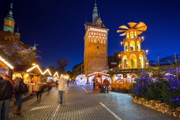 Traditional Christmas fair in the old town of Gdansk, Poland. Gdansk is the historical capital of Polish Pomerania with gothic architecture.