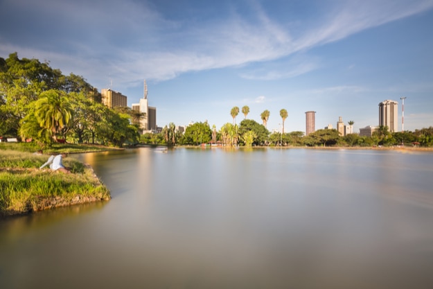 Skyline of Nairobi, Kenya with the beautiful lake in Uhuru Park in the foreground