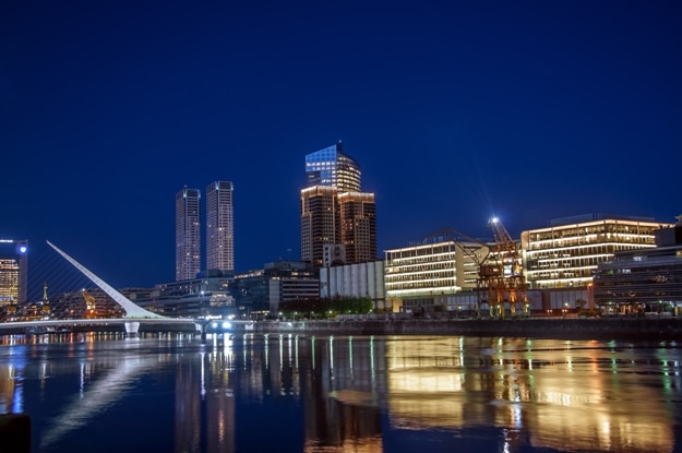 Beautiful Puerto Madero and the Women's Bridge at night