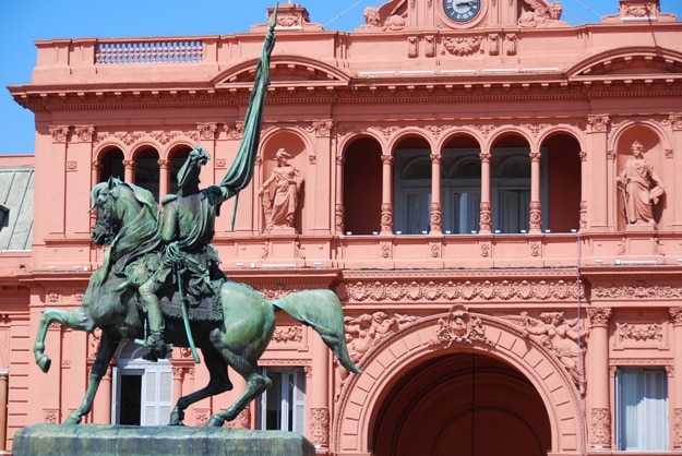 General Belgrano monument in front of Casa Rosada (pink house) Buenos Aires Argentina.La Casa Rosada is the official seat of the executive branch of the government of Argentina