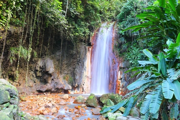 The famous diamond waterfall in the botanical gardens of St. Lucia