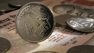 Rupee falls 14 paise against US dollar in early trade