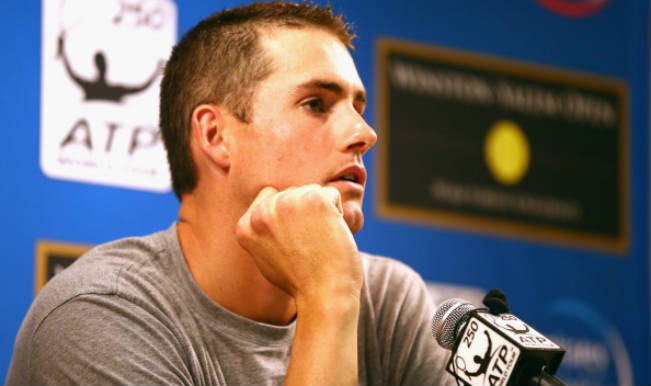 John Isner pulls out of Winston-Salem Open quarters with a left ankle injury