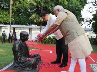 Chinese President Xi Jinping visits Rajghat