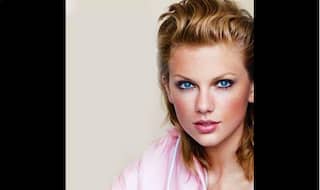 Taylor Swift: Pharrell Williams makes me happy