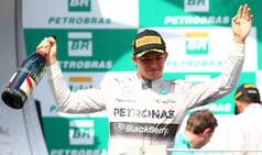 Nico Rosberg pips Lewis Hamilton to win Brazilian GP, keeps title race alive