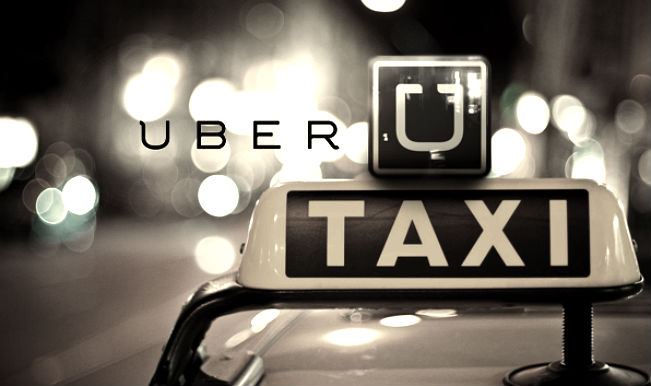 Paris taxis block highway to urge ban on Uber
