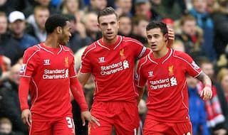 Barclays Premier League 2014-15: Jordan Henderson and Philippe Coutinho help Liverpool dent Manchester City’s title ambitions