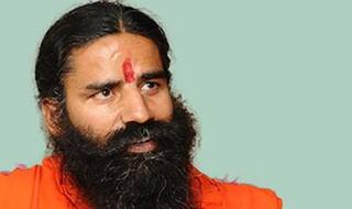 Reporter held for carrying live cartridges to Baba Ramdev interview