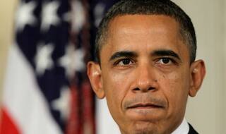 Barack Obama heckled at White House LGBT event