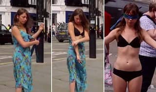 Watch video of girl stripping to her underwear in public!