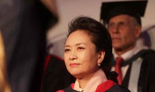 Peng Liyuan in spotlight as she accompanies Xi Jinping on US tour