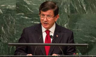 Turkey PM Ahmet Davutoglu urges Russia to give up baseless claims on IS trade