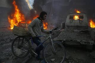 Airstrikes on rebel-held Syrian district kill 9 civilians