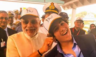 PM Narendra Modi meets Akshay Kumar's son Aarav Kumar at International Fleet Review 2016, pulls at his ear!