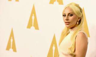 Lady Gaga gets David Bowie inked on her