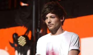 Louis Tomlinson upset with One Direction members for not visiting his son
