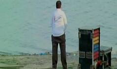 'Clean Ganga' T-shirt wearing ADM caught on camera urinating at Triveni Sangam (Watch video)