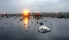 Russian workers comb debris-laden plane crash site