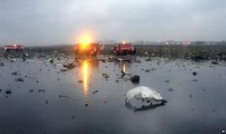 Russian workers comb debris-laden plane crash site