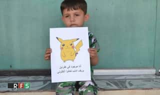 These Syrian children hold images of Pokémon hoping to be rescued from warzone