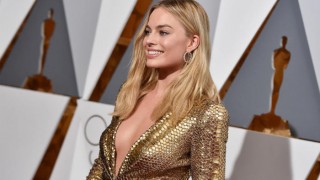 Margot Robbie madly in love with Tom Ackerley, but too busy to get married