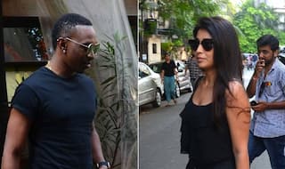 Spotted! Cricketer Dwayne Bravo with actress Shriya Saran at Mumbai restaurant! (See pic)