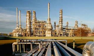 Oil prices increase as global producers agree to cut output