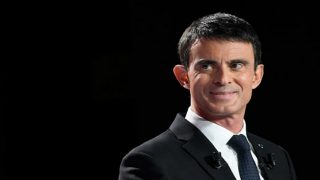 French presidential hopeful Valls attacked over migrants