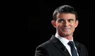 French presidential hopeful Valls attacked over migrants