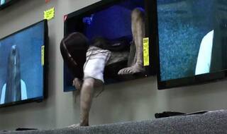 Terrifying Rings girl Samara pranks patrons at TV store in this hilarious viral video!