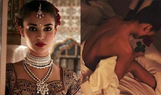 Amy Jackson goes topless in bed, shares first picture on Instagram after phone hacking!