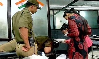 Two terrorists snatch AK-47 rifle from policeman; one held