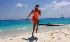 Malaika Arora Khan holidays in Maldives in vibrant bikini cover-up! View Pics!