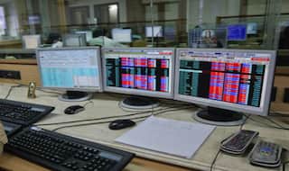 Sensex, Nifty close in red after RBI keeps rate unchanged