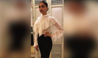 Deepika Padukone pulls off monochrome style with immaculate sophistication for an event! View Pictures
