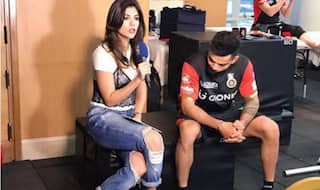 Virat Kohli caught ogling at IPL 2017 anchor Archana Vijaya’s ripped jeans in mistimed viral picture!