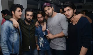 Shah Rukh Khan's son Aryan attends a club opening as a celebrity guest but has no time to smile!