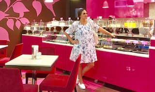 Pregnant Esha Deol flaunts her baby bump at a cupcake shop! See picture of the excited mom to be craving for some sugar rush